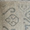 06235 Khotan Chinese White Green 8-4x11-6 | Manoukian Rugs™ corner
